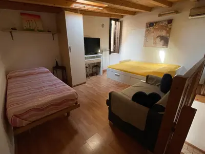 Letto o letti in una camera di Cà Batuffolin
