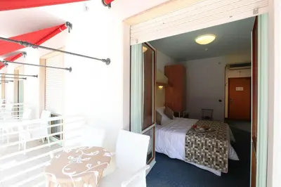 Letto o letti in una camera di Hotel Derby S