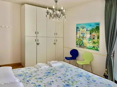 Letto o letti in una camera di Residence Laguna Giudecca