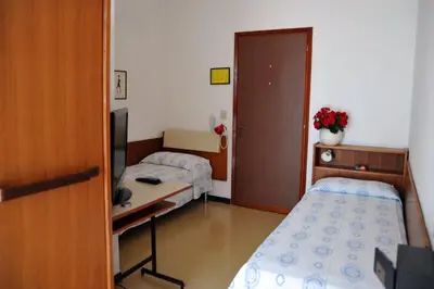 Letto o letti in una camera di Hotel Reno
