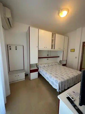 Letto o letti in una camera di Hotel Reno