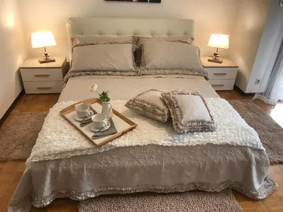 Letto o letti in una camera di Casa Martini Abano
