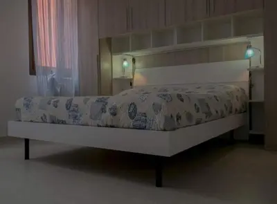 Letto o letti in una camera di casa dei nonni