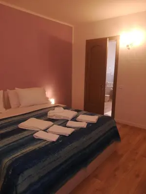 Letto o letti in una camera di La Libellula