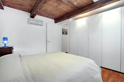 Letto o letti in una camera di Fenix Do Dogi Apartments