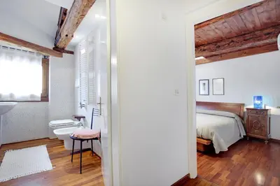 Letto o letti in una camera di Fenix Do Dogi Apartments