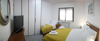 Letto o letti in una camera di Rosa Garden B&B