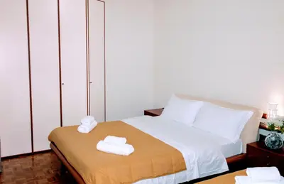 Letto o letti in una camera di Rosa Garden B&B