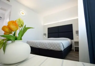 Letto o letti in una camera di Guest House DOLCE LAGUNA 2