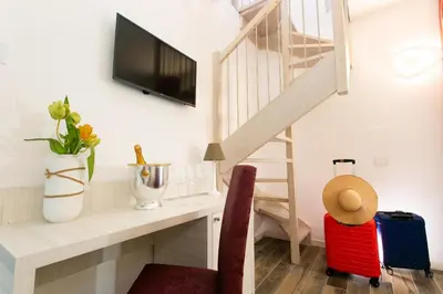 TV o dispositivi per l'intrattenimento presso Guest House DOLCE LAGUNA 2