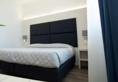 Letto o letti in una camera di Guest House DOLCE LAGUNA 2