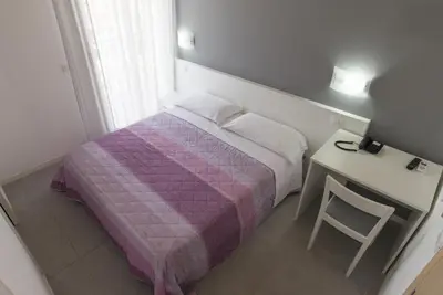 Letto o letti in una camera di Hotel Atene