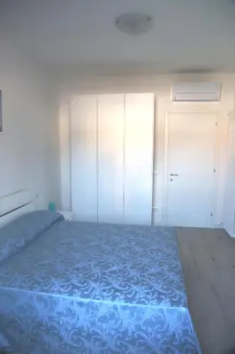 Letto o letti in una camera di Via Cipro 16