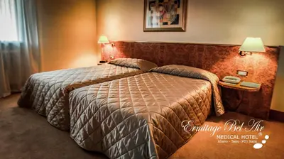 Letto o letti in una camera di Ermitage Bel Air Medical Hotel