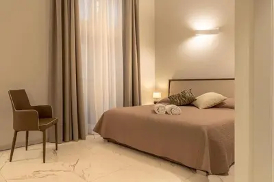 Letto o letti in una camera di Il Pozzo Magico