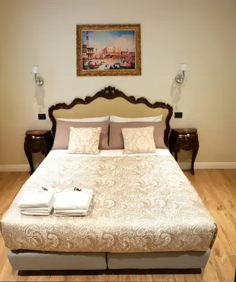 Letto o letti in una camera di B&B Fine Venice