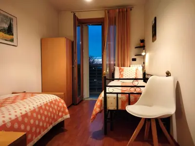 Letto o letti in una camera di Sunset View Treviso Apartment