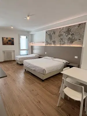 Letto o letti in una camera di M14 Duomo Apartments