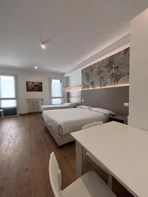 Letto o letti in una camera di M14 Duomo Apartments