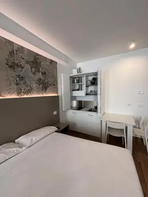 Letto o letti in una camera di M14 Duomo Apartments