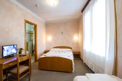 Letto o letti in una camera di Albergo Ristorante Da Felice