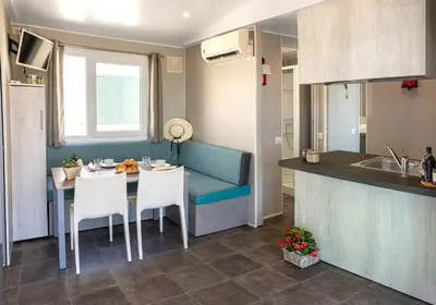 Cucina o angolo cottura di Camping Atlanta & Mediterraneo Family Village