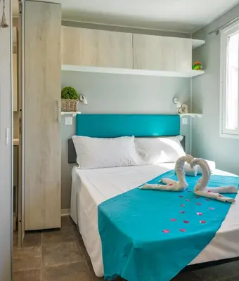 Letto o letti in una camera di Camping Atlanta & Mediterraneo Family Village