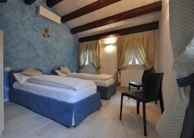 Letto o letti in una camera di The Home of the Ship Builder