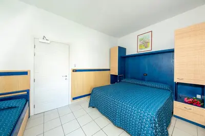 Letto o letti in una camera di Hotel Olanda