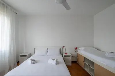 Letto o letti in una camera di GuestHost - Padova Terrace Flat
