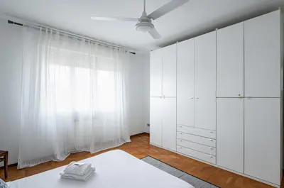 Letto o letti in una camera di GuestHost - Padova Terrace Flat