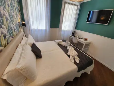 Letto o letti in una camera di Residence Eleonora