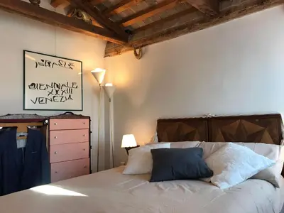 Letto o letti in una camera di Biennale Art 1886