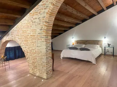 Letto o letti in una camera di Albaspina BioAgriturismo