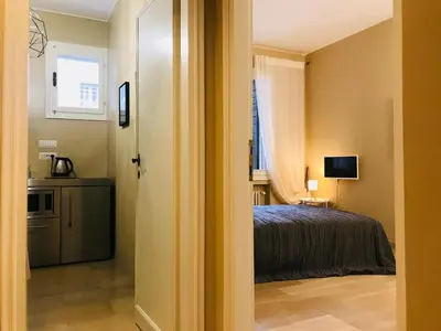 Letto o letti in una camera di Cruise Studio