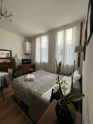 Letto o letti in una camera di Elegant Apartment