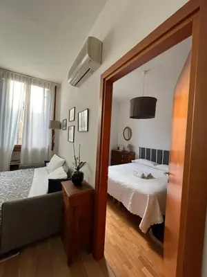 Letto o letti in una camera di Elegant Apartment