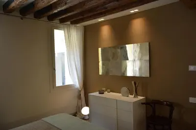 Letto o letti in una camera di Ca' Corte San Rocco