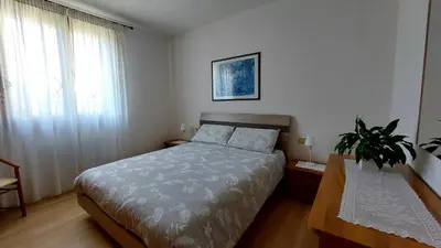 Letto o letti in una camera di Castagnole Apartment