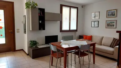 Area soggiorno di Castagnole Apartment