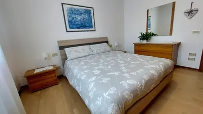 Letto o letti in una camera di Castagnole Apartment