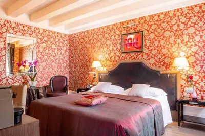 Letto o letti in una camera di Hotel Moresco