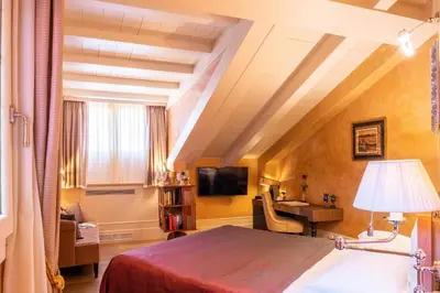 Letto o letti in una camera di Hotel Moresco