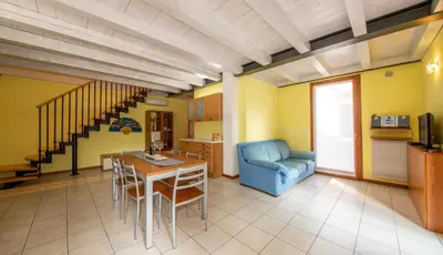 Area soggiorno di House Smeraldo by Holiday World