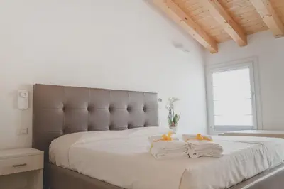 Letto o letti in una camera di Terra Ferma Rooms&More
