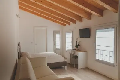 TV o dispositivi per l'intrattenimento presso Terra Ferma Rooms&More
