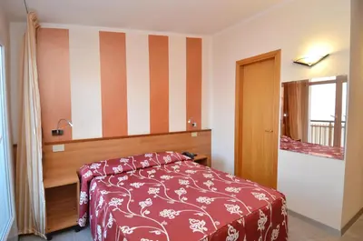 Letto o letti in una camera di Hotel Righetto Fronte Mare