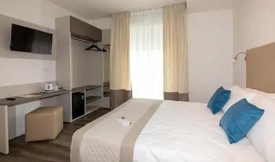 Letto o letti in una camera di Hotel Mayer