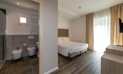 Letto o letti in una camera di Hotel Mayer