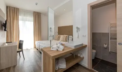 Letto o letti in una camera di Hotel Mayer